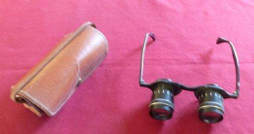 An unusual pair of wearable opera glasses