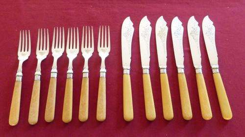 Set of six bone handle fish knives and forks