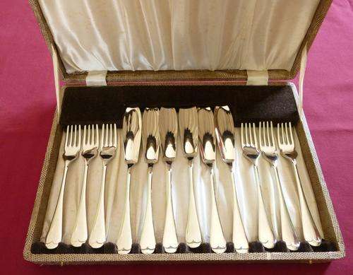 Boxed set of six silver plated fish knives and forks