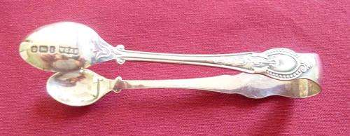 Pair of art nouveau silver tongs