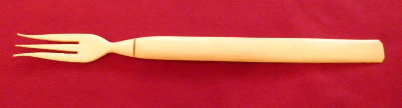An ivory salad fork