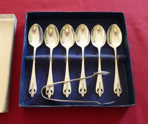 Set of six silver teaspoons and tongs