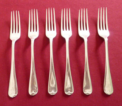 Six silver plated dessert forks