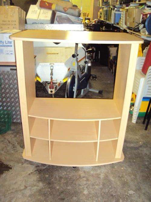 TV cabinet, strong and reliable with wheels.
