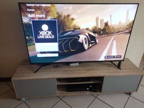Xbox One X Console Bundle (Console + 4 Games and Controller Battery Pack)