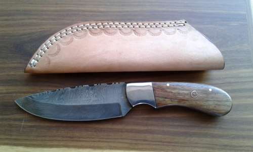 DAMASCUS Hand Made Knife, Leather sheath included. Awesome knife.