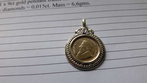 Kruger 1/10th Oz Pendant set with 9ct gold frame and 3 diamonds, Insurance valuation included.