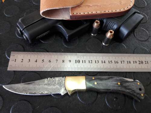 Handmade DAMASCUS  Folding Knife. Please study pictures for detail. Crazy R1 start, No reserve.