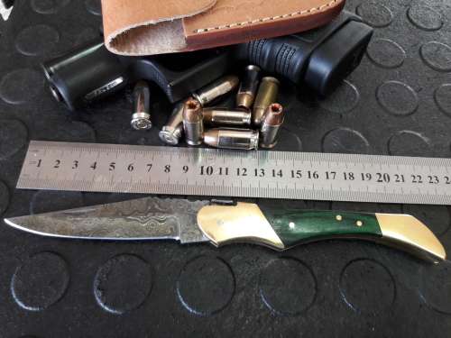 Handmade DAMASCUS  Folding Knife. Please study pictures for detail. Crazy R1 start, No reserve.