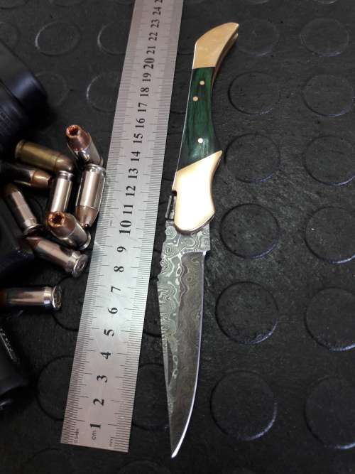 Handmade DAMASCUS  Folding Knife. Please study pictures for detail. Crazy R1 start, No reserve.