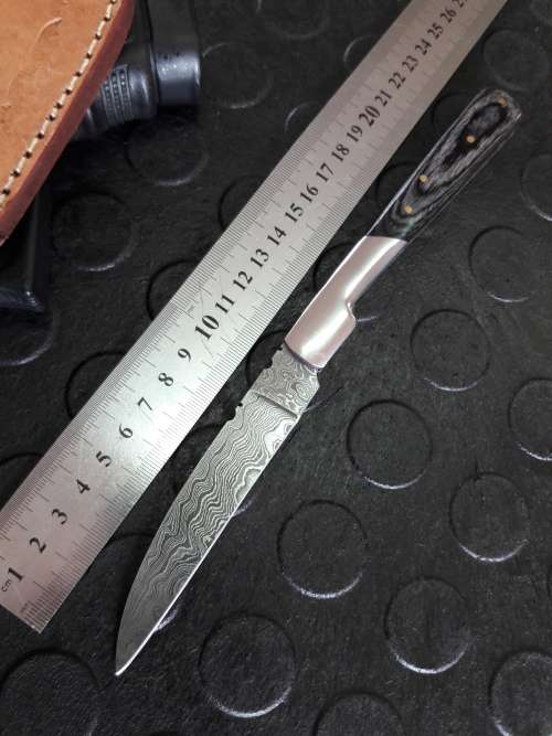Handmade DAMASCUS  Folding Knife. Please study pictures for detail. Crazy R1 start, No reserve.