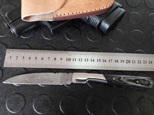 Handmade DAMASCUS  Folding Knife. Please study pictures for detail. Crazy R1 start, No reserve.
