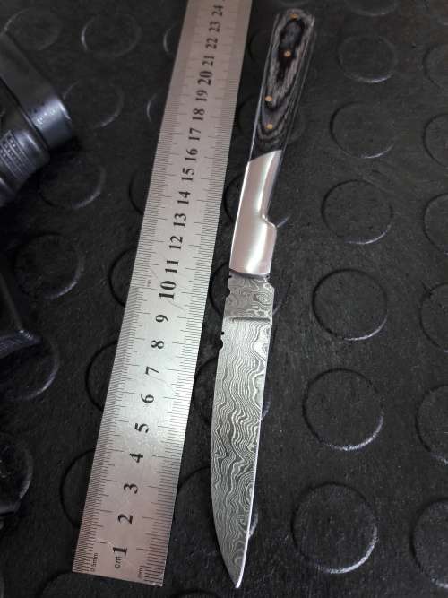 Handmade DAMASCUS  Folding Knife. Please study pictures for detail. Crazy R1 start, No reserve.