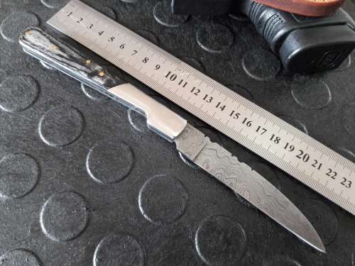 Handmade DAMASCUS  Folding Knife. Please study pictures for detail. Crazy R1 start, No reserve.