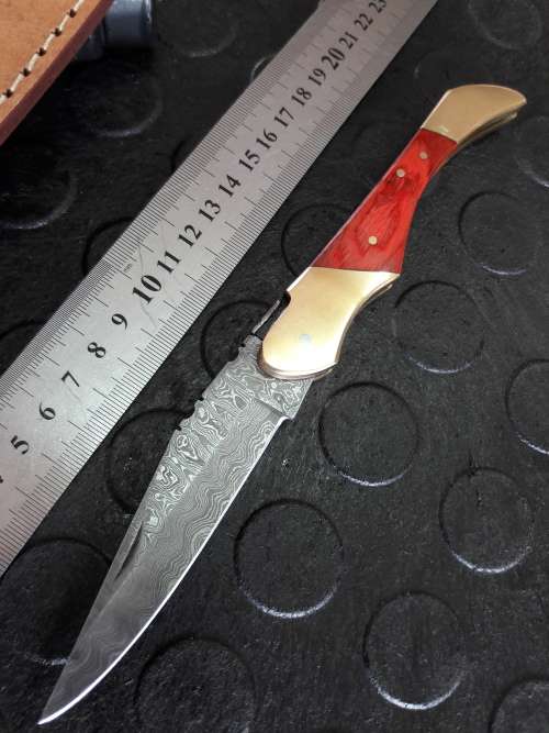 Handmade DAMASCUS  Folding Knife. Please study pictures for detail. Crazy R1 start, No reserve.