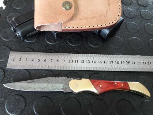 Handmade DAMASCUS  Folding Knife. Please study pictures for detail. Crazy R1 start, No reserve.
