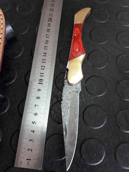 Handmade DAMASCUS  Folding Knife. Please study pictures for detail. Crazy R1 start, No reserve.