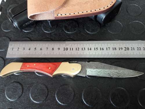 Handmade DAMASCUS  Folding Knife. Please study pictures for detail. Crazy R1 start, No reserve.