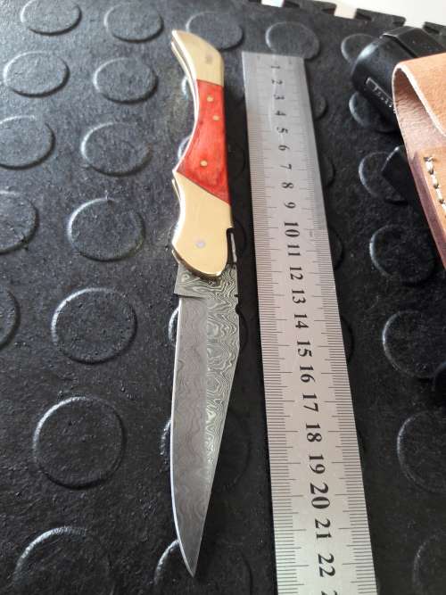 Handmade DAMASCUS  Folding Knife. Please study pictures for detail. Crazy R1 start, No reserve.