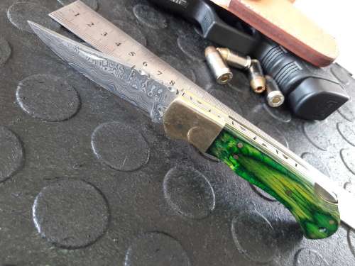Handmade DAMASCUS  Folding Knife. Please study pictures for detail. Crazy R1 start, No reserve.