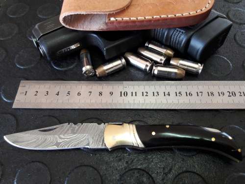 Handmade DAMASCUS  Folding Knife. BULL horn handle scales. Crazy R1 start, No reserve.