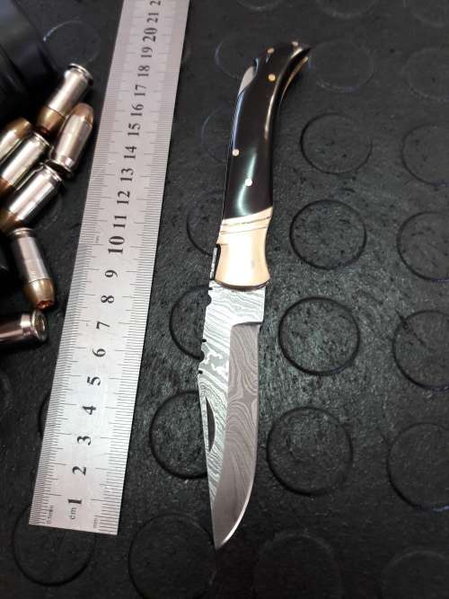 Handmade DAMASCUS  Folding Knife. BULL horn handle scales. Crazy R1 start, No reserve.