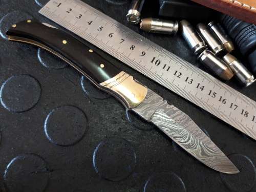 Handmade DAMASCUS  Folding Knife. BULL horn handle scales. Crazy R1 start, No reserve.