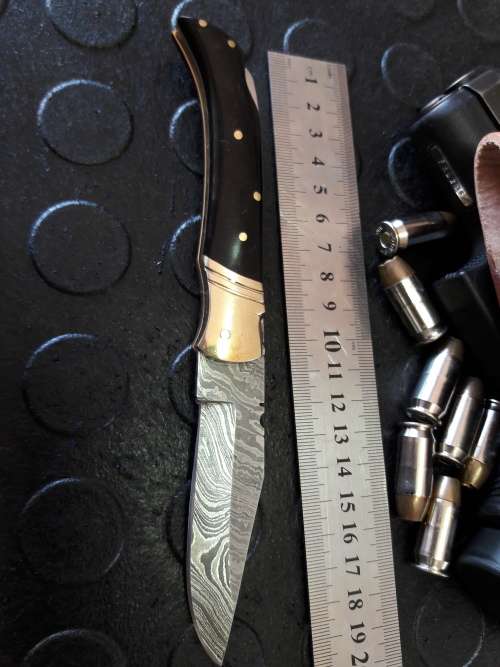 Handmade DAMASCUS  Folding Knife. BULL horn handle scales. Crazy R1 start, No reserve.