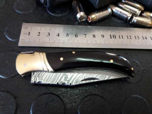 Handmade DAMASCUS  Folding Knife. BULL horn handle scales. Crazy R1 start, No reserve.