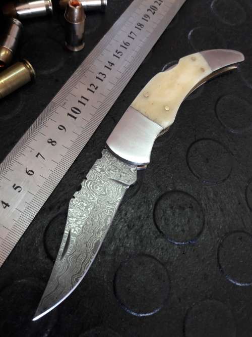 Handmade DAMASCUS  Folding Knife. Please study pictures for detail. Crazy R1 start, No reserve.