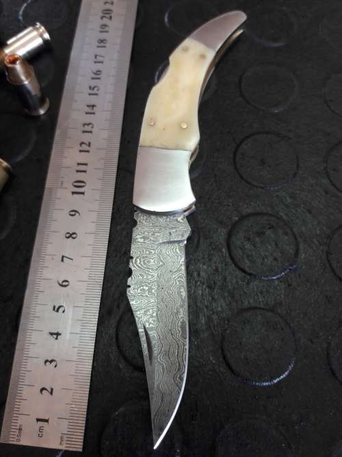 Handmade DAMASCUS  Folding Knife. Please study pictures for detail. Crazy R1 start, No reserve.