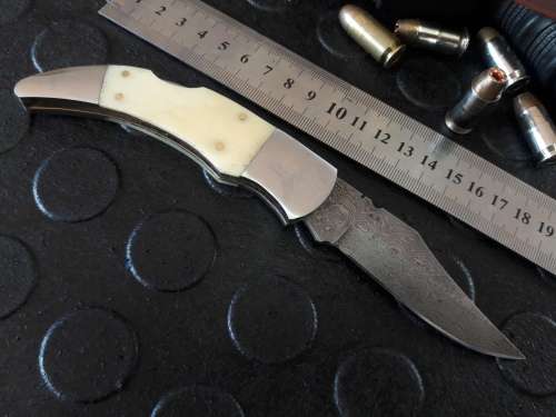 Handmade DAMASCUS  Folding Knife. Please study pictures for detail. Crazy R1 start, No reserve.