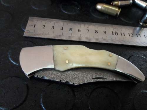 Handmade DAMASCUS  Folding Knife. Please study pictures for detail. Crazy R1 start, No reserve.