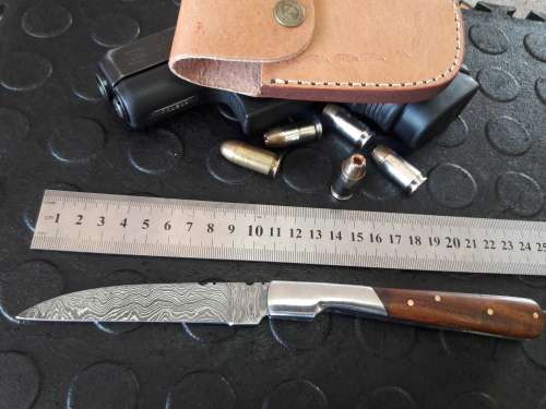 Handmade DAMASCUS  Folding Knife. Please study pictures for detail. Crazy R1 start, No reserve.