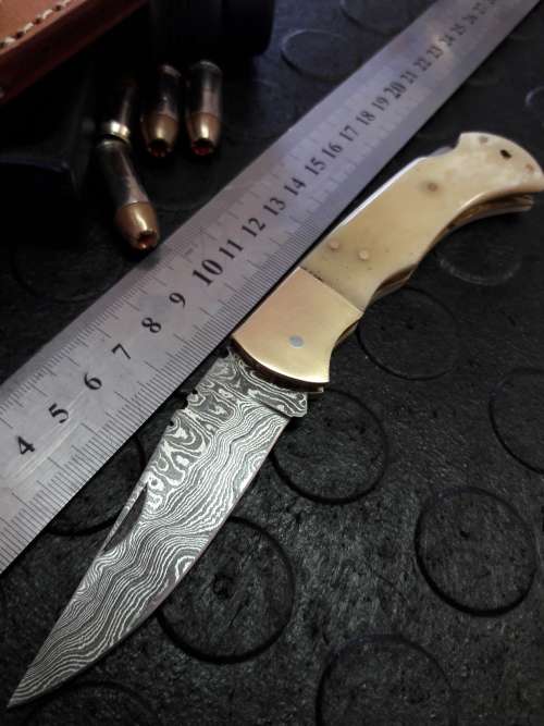Handmade DAMASCUS  Folding Knife. Please study pictures for detail. Crazy R1 start, No reserve.