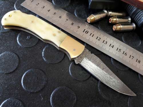 Handmade DAMASCUS  Folding Knife. Please study pictures for detail. Crazy R1 start, No reserve.