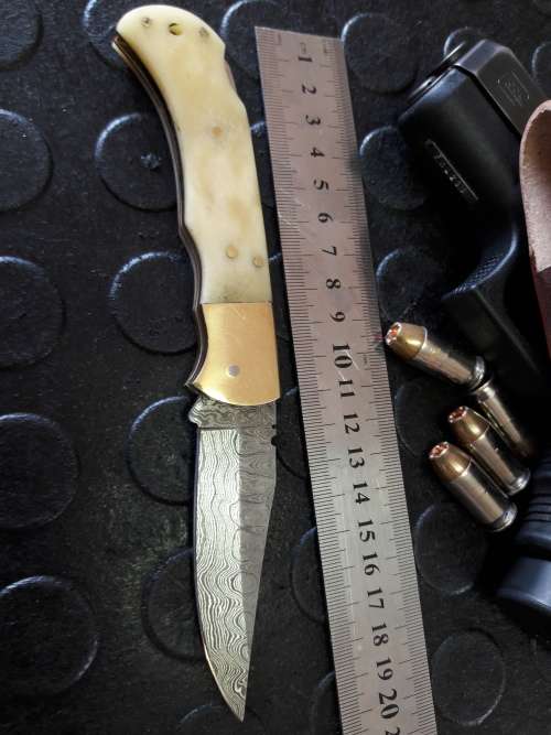 Handmade DAMASCUS  Folding Knife. Please study pictures for detail. Crazy R1 start, No reserve.