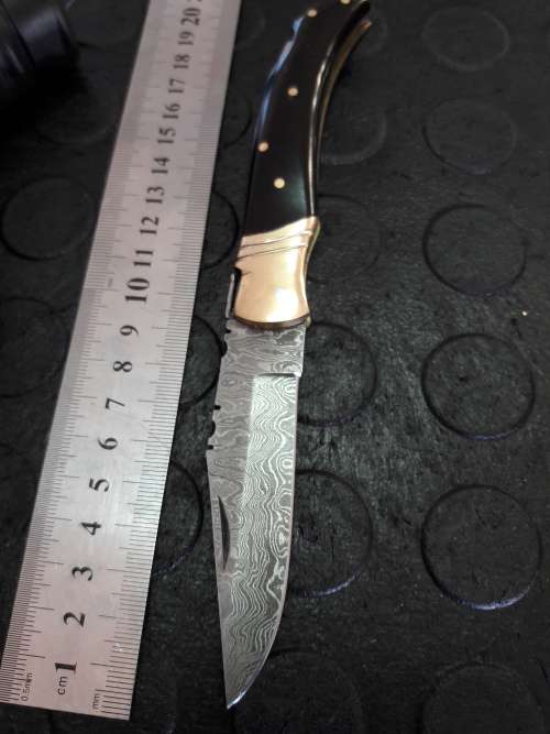 Handmade DAMASCUS  Folding Knife with Bull Horn handle scales. Crazy R1 start, No reserve.
