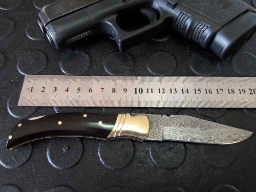 Handmade DAMASCUS  Folding Knife with Bull Horn handle scales. Crazy R1 start, No reserve.