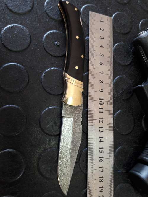 Handmade DAMASCUS  Folding Knife with Bull Horn handle scales. Crazy R1 start, No reserve.