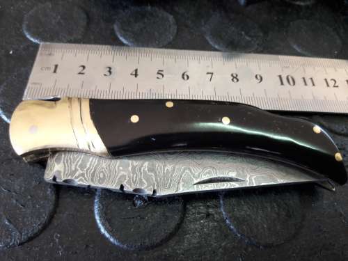 Handmade DAMASCUS  Folding Knife with Bull Horn handle scales. Crazy R1 start, No reserve.