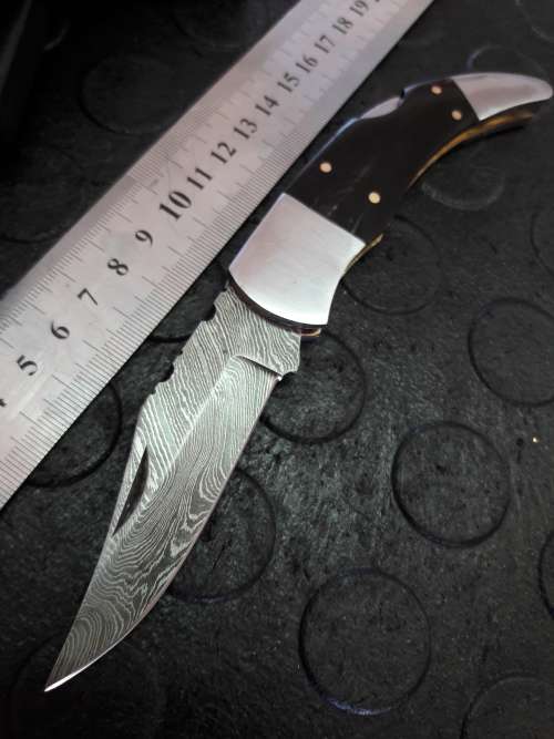 Handmade DAMASCUS  Folding Knife with Bull Horn handle scales. Crazy R1 start, No reserve.