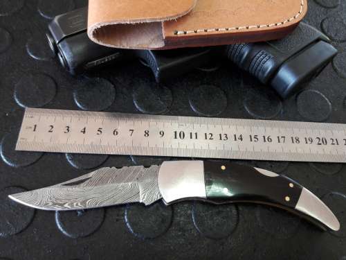 Handmade DAMASCUS  Folding Knife with Bull Horn handle scales. Crazy R1 start, No reserve.