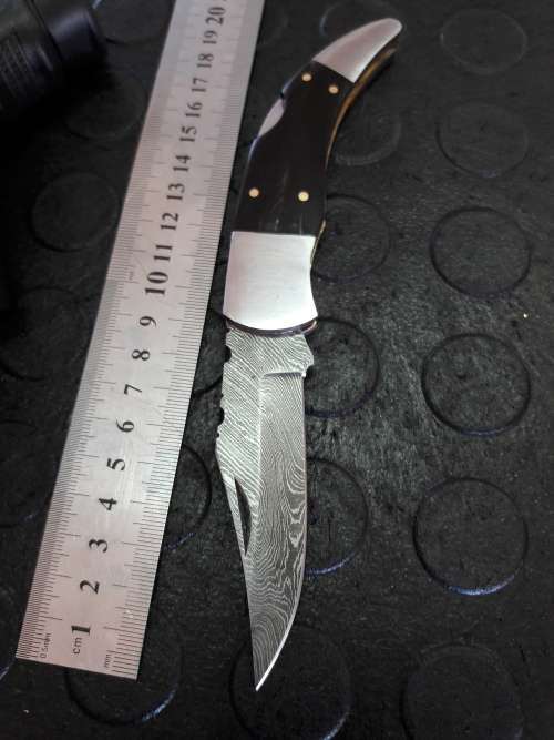 Handmade DAMASCUS  Folding Knife with Bull Horn handle scales. Crazy R1 start, No reserve.
