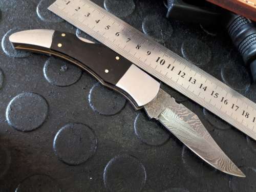 Handmade DAMASCUS  Folding Knife with Bull Horn handle scales. Crazy R1 start, No reserve.