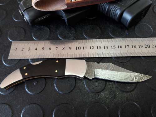 Handmade DAMASCUS  Folding Knife with Bull Horn handle scales. Crazy R1 start, No reserve.