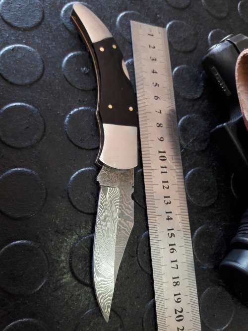 Handmade DAMASCUS  Folding Knife with Bull Horn handle scales. Crazy R1 start, No reserve.