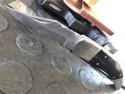 Handmade DAMASCUS  Folding Knife with Bull Horn handle scales. Crazy R1 start, No reserve.