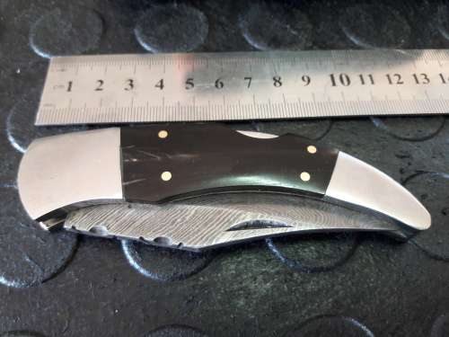 Handmade DAMASCUS  Folding Knife with Bull Horn handle scales. Crazy R1 start, No reserve.