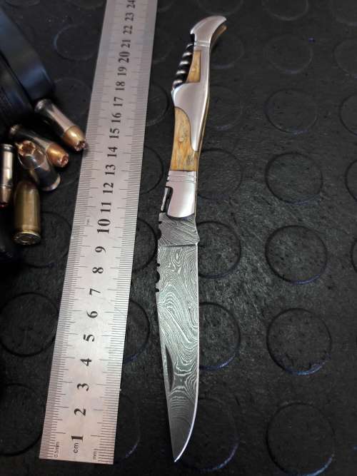 Handmade DAMASCUS  Folding Knife. Please study pictures for detail. Crazy R1 start, No reserve.
